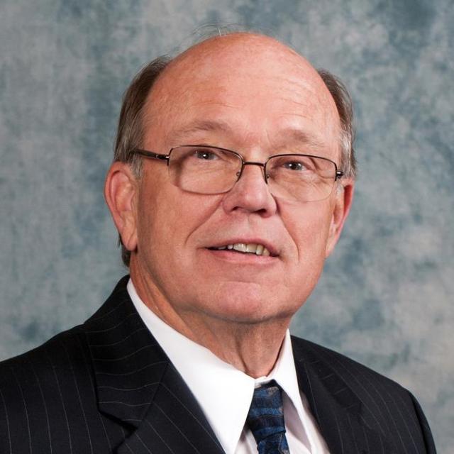Board President David J. Slawson.
